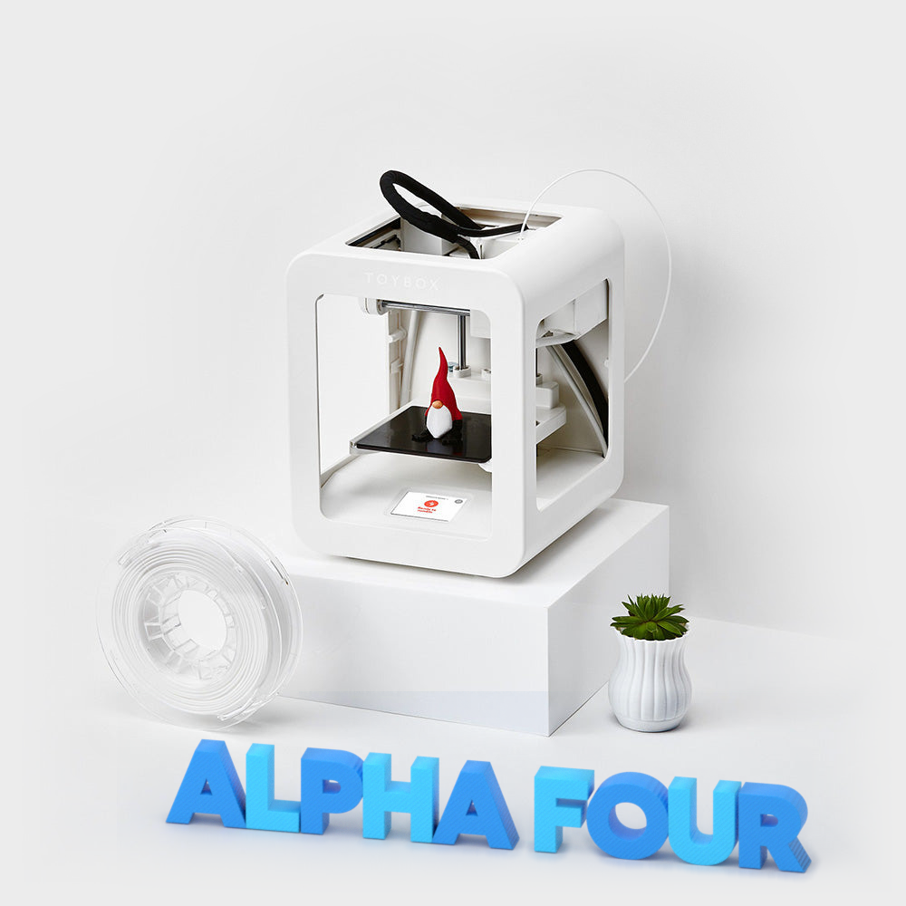 Toybox Alpha Four 3D printer with ALPHA FOUR letters, background fading to light gray