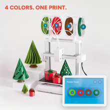 Load image into Gallery viewer, Toybox Luna printing in 4 colors at once, with the Printer Food screen showing all four rolls