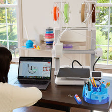 Load image into Gallery viewer, Designing a toy on a laptop next to Toybox Luna